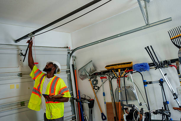 Professional Garage Door Panel Replacement technician working in Mount Penn, PA